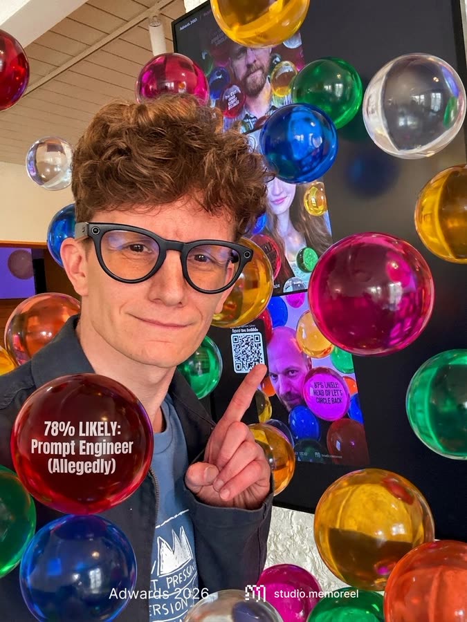 Generated portrait of a young man in glasses making a V-sign among coloured orbs, one labelled 'Prompt engineer (allegedly)'.