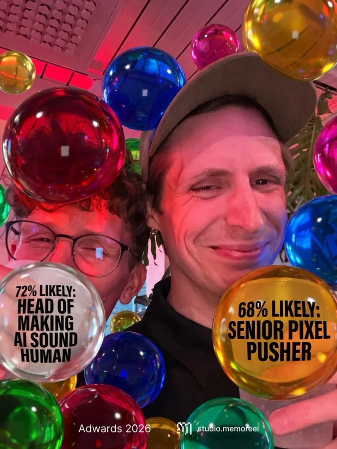Generated portrait of two men in red event lighting surrounded by orbs with joke job titles.